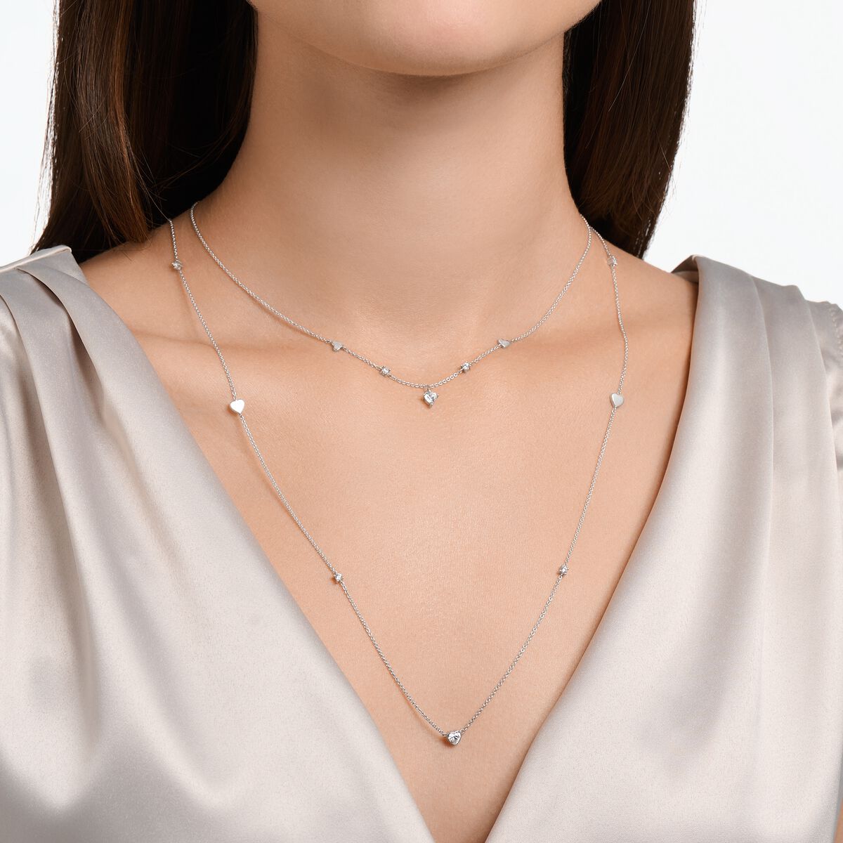 Necklace with hearts and white stones silver