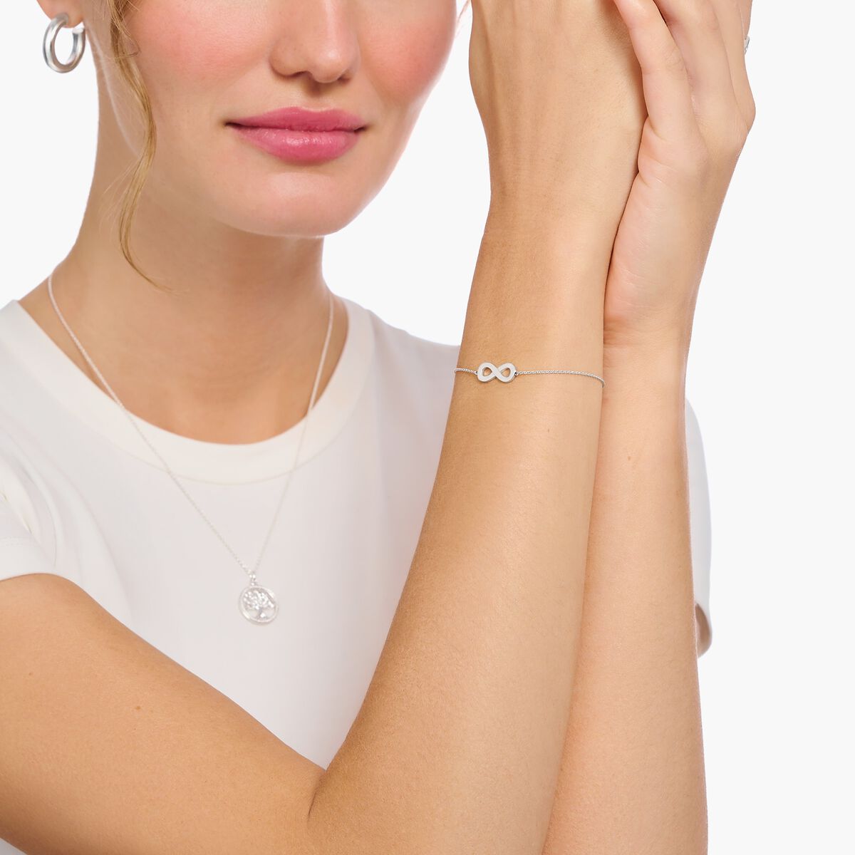 Silver bracelet with infinity pendant