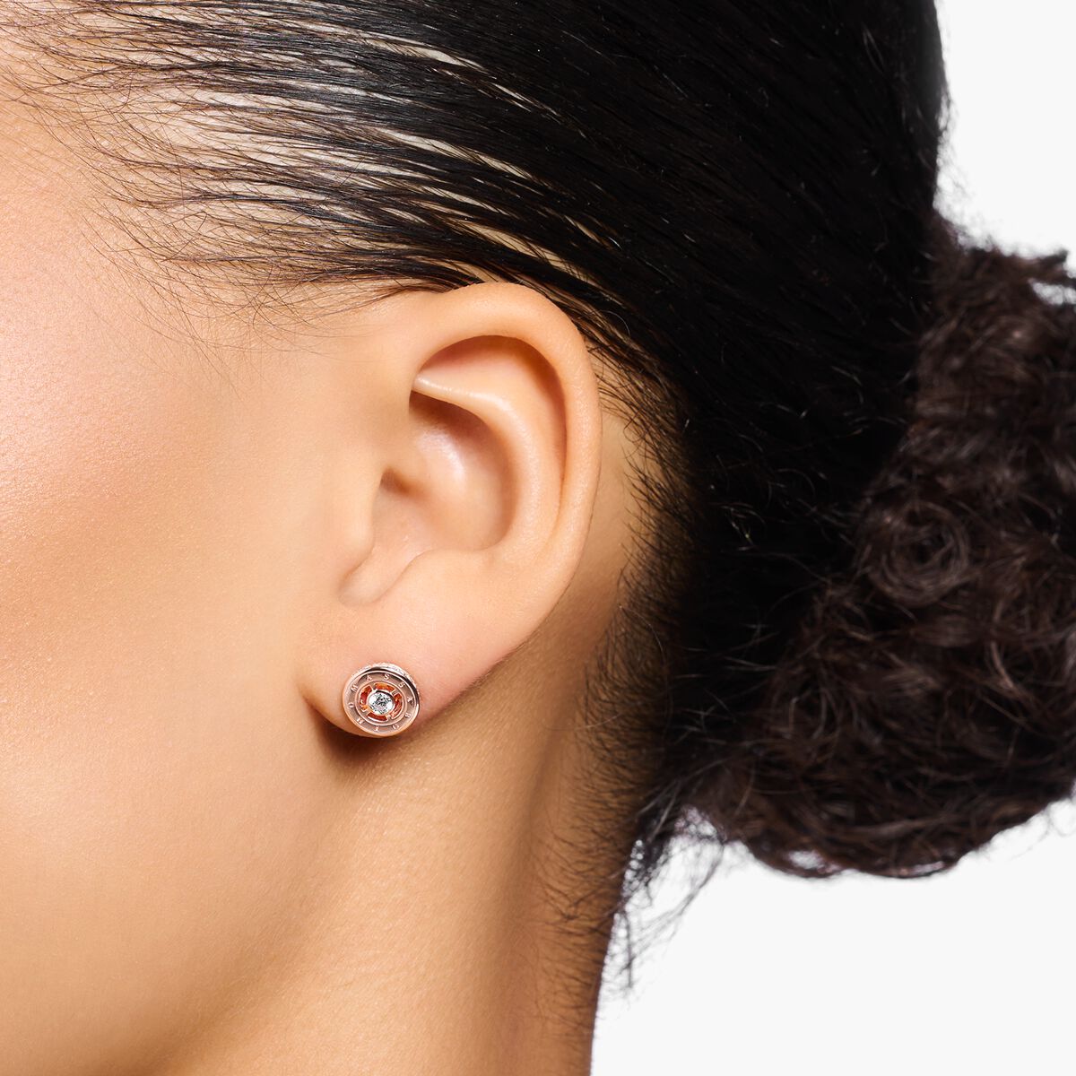 Ear studs with white stones rose gold plated