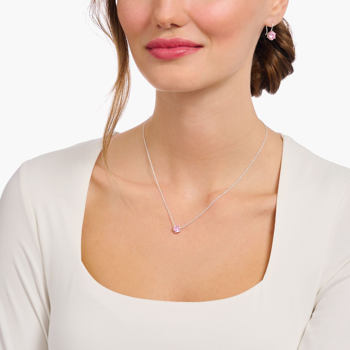 silver necklace with pink zirconia pendant