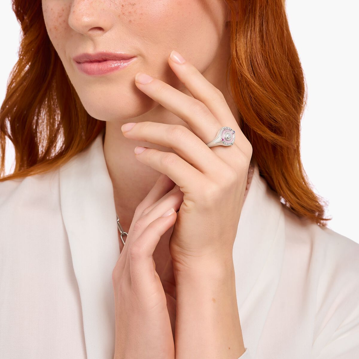 Silver signet ring with stones and pinkish cold enamel