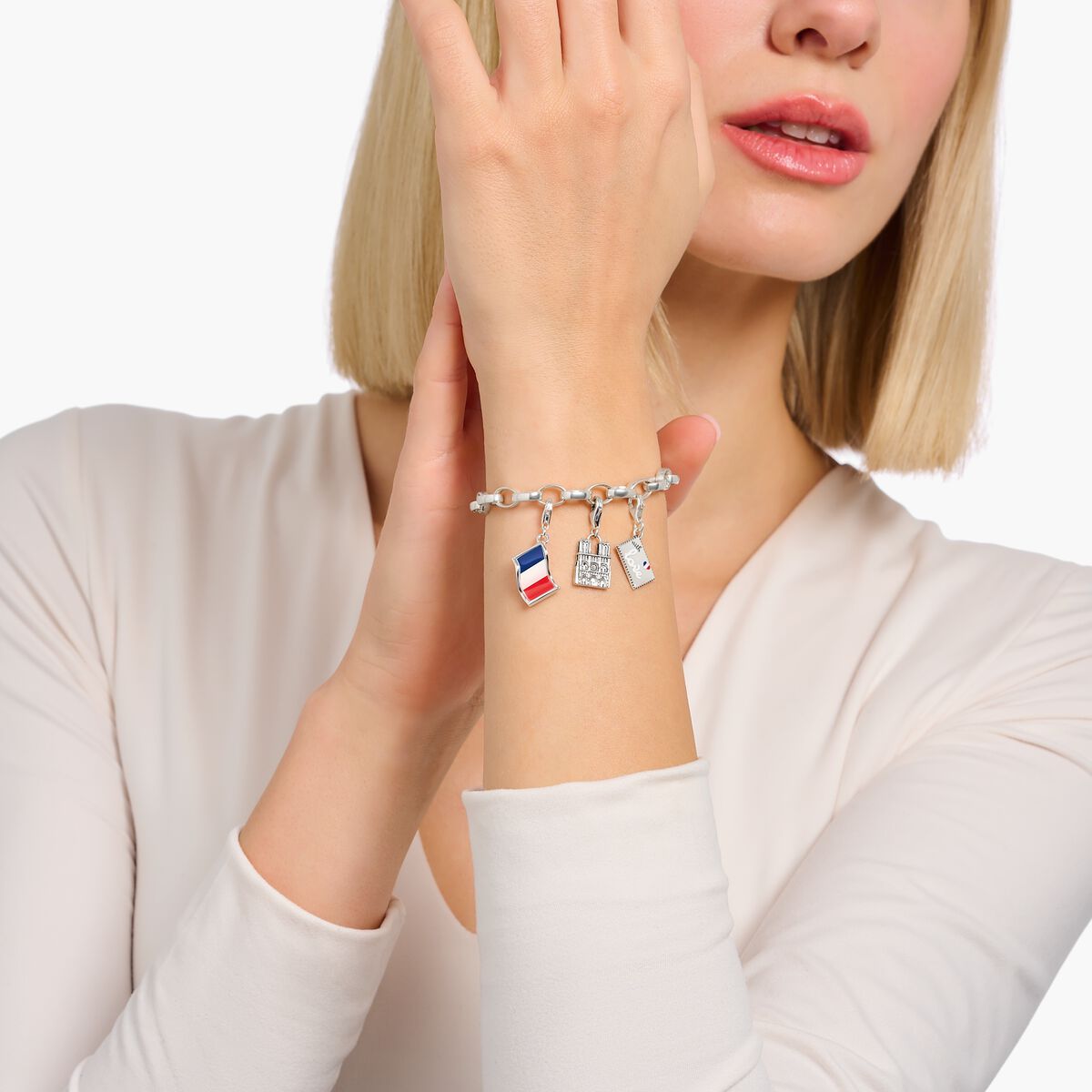 Charm bracelet with white Coin silver