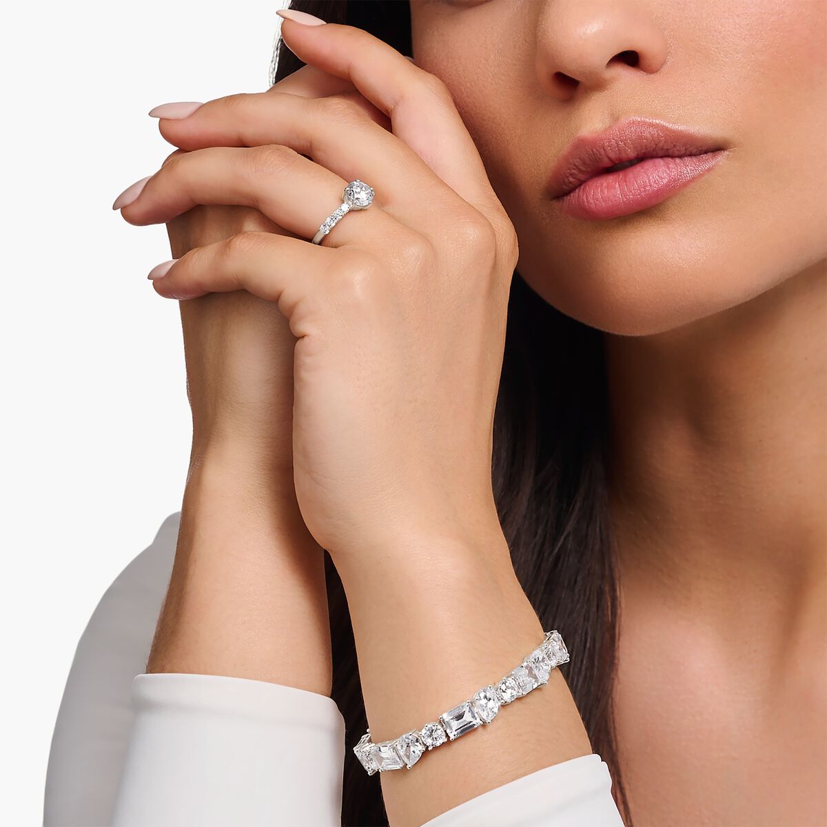 Silver solitaire ring with white zirconia in different sizes