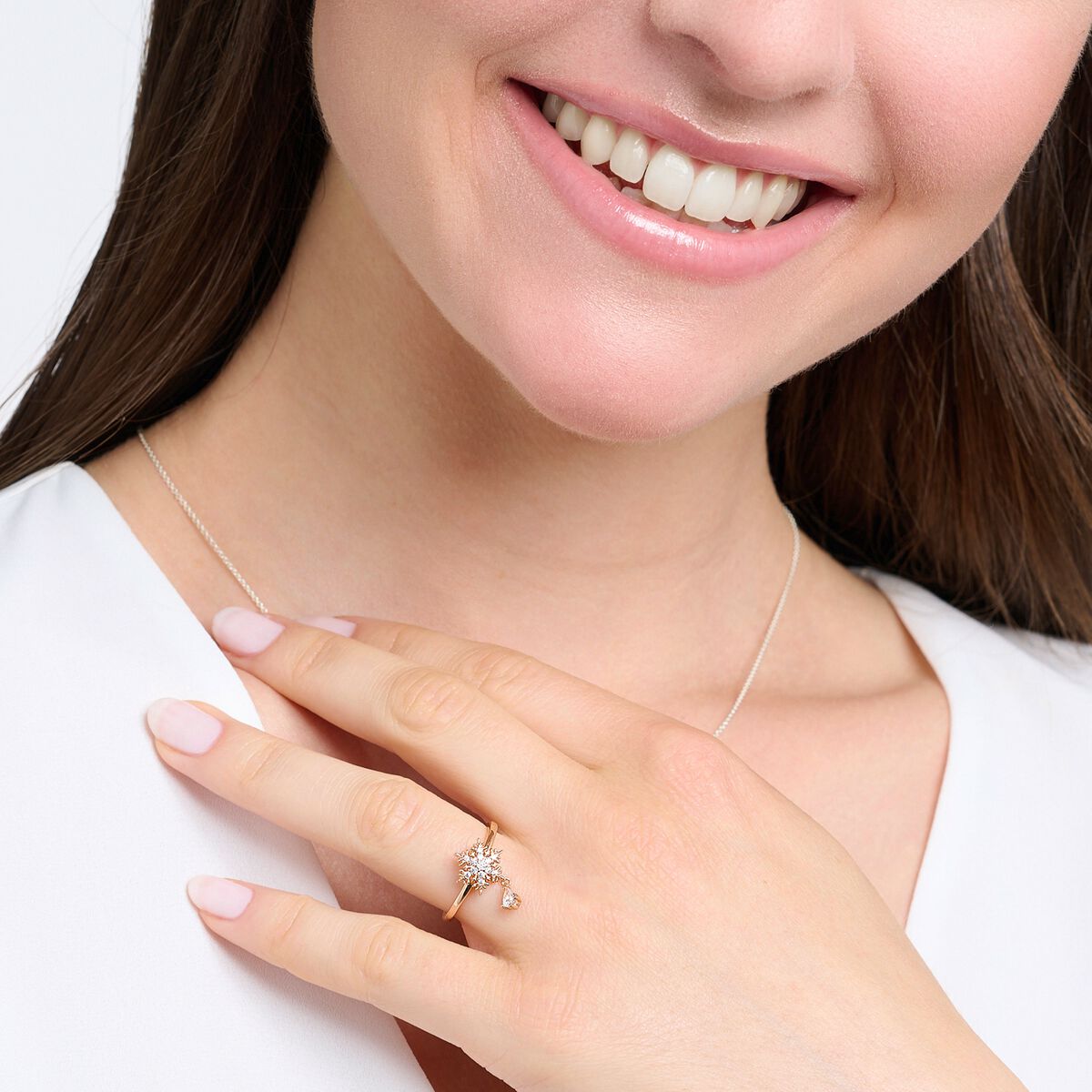Ring snowflake with white stones rose gold