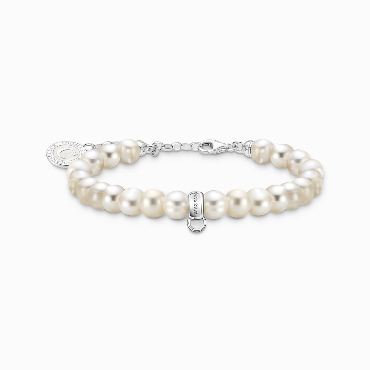 Silver charm bracelet with white oval-shaped pearls