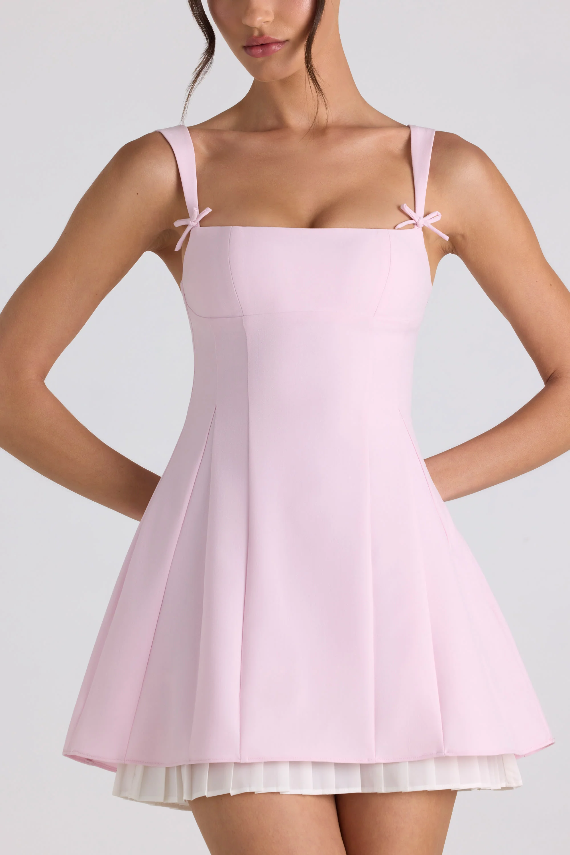 Bow-Detail Pleated A-Line Mini Dress in Soft Pink - TREBLEV