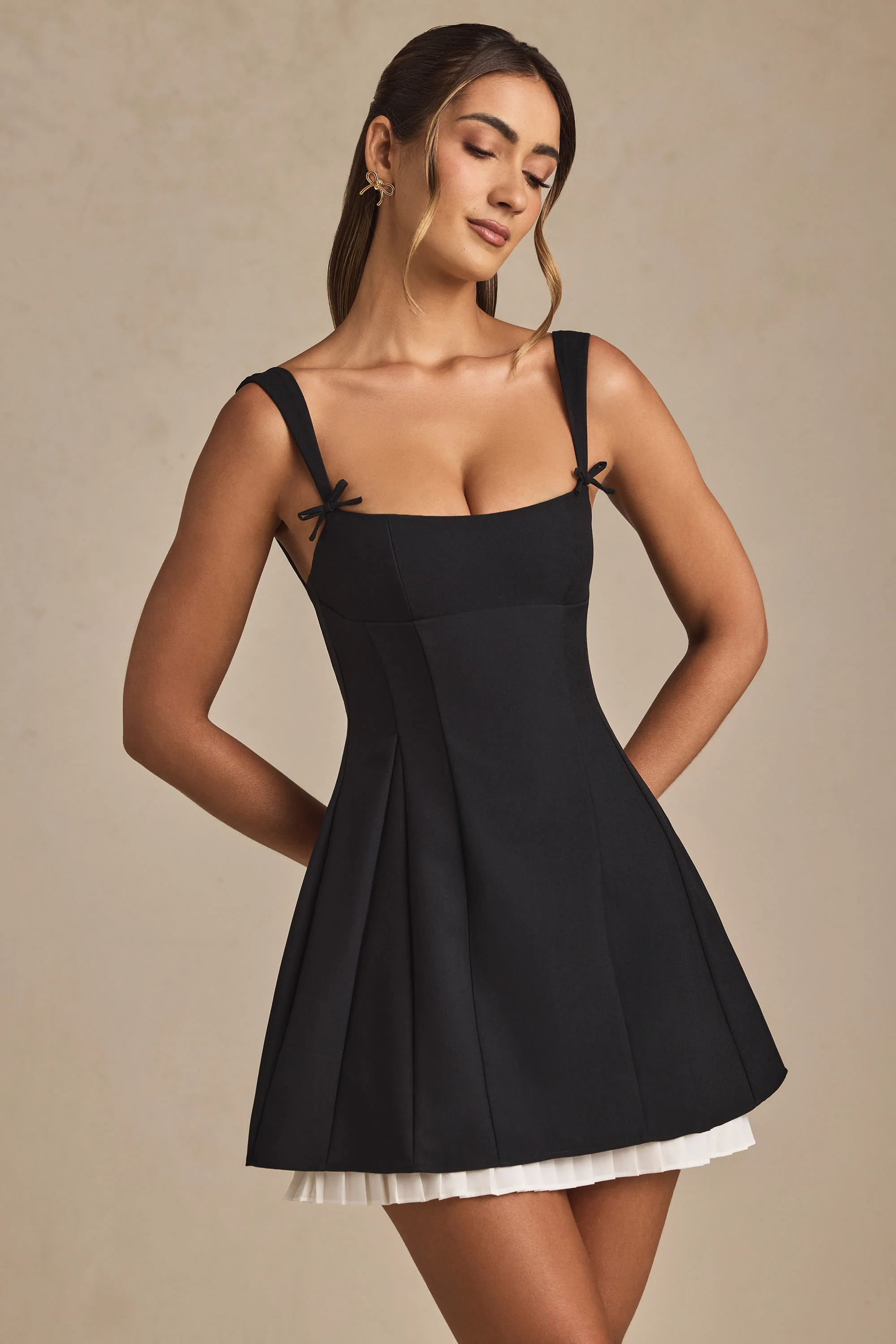 Bow-Detail Pleated A-Line Mini Dress in Black - TREBLEV