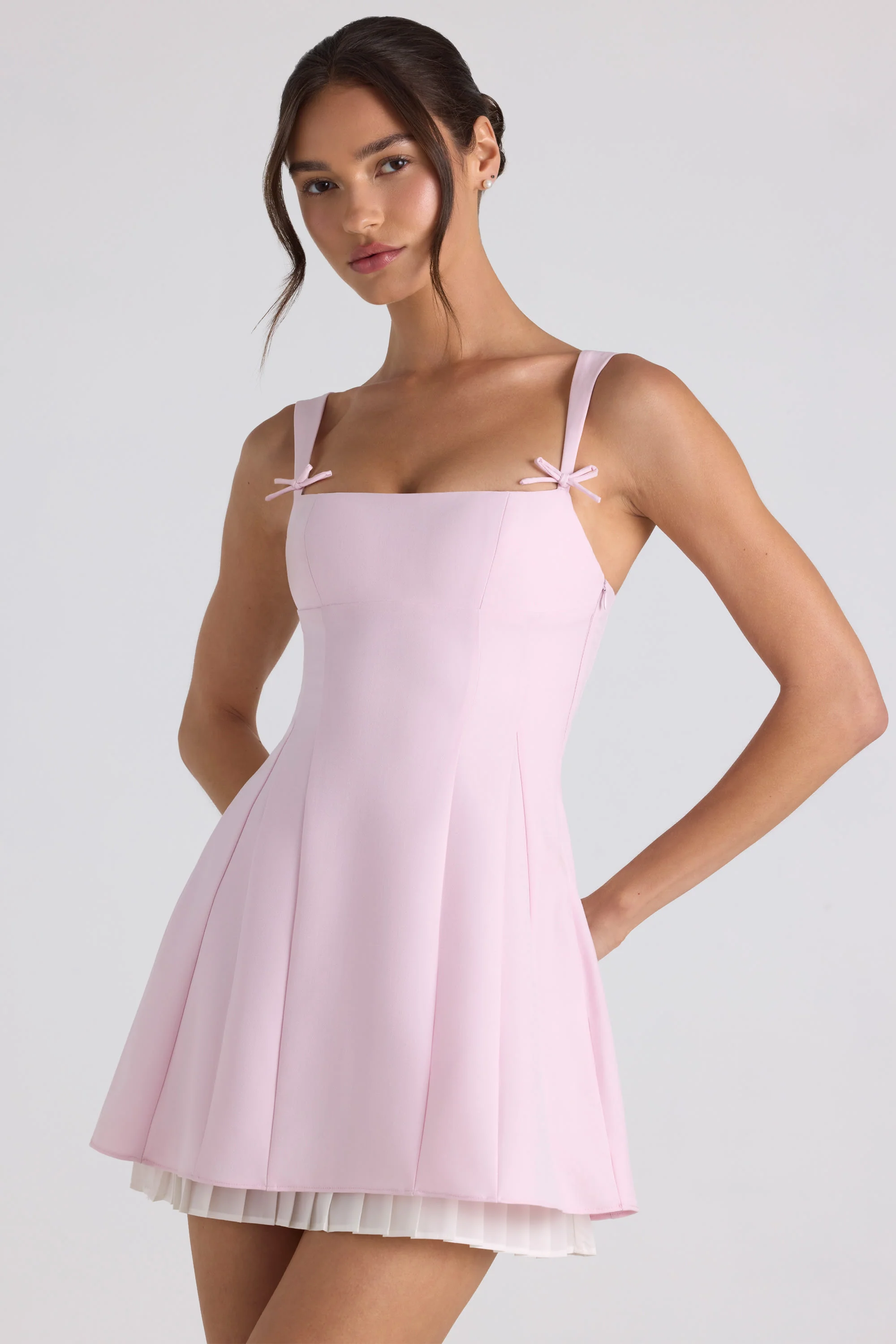 Bow-Detail Pleated A-Line Mini Dress in Soft Pink - TREBLEV