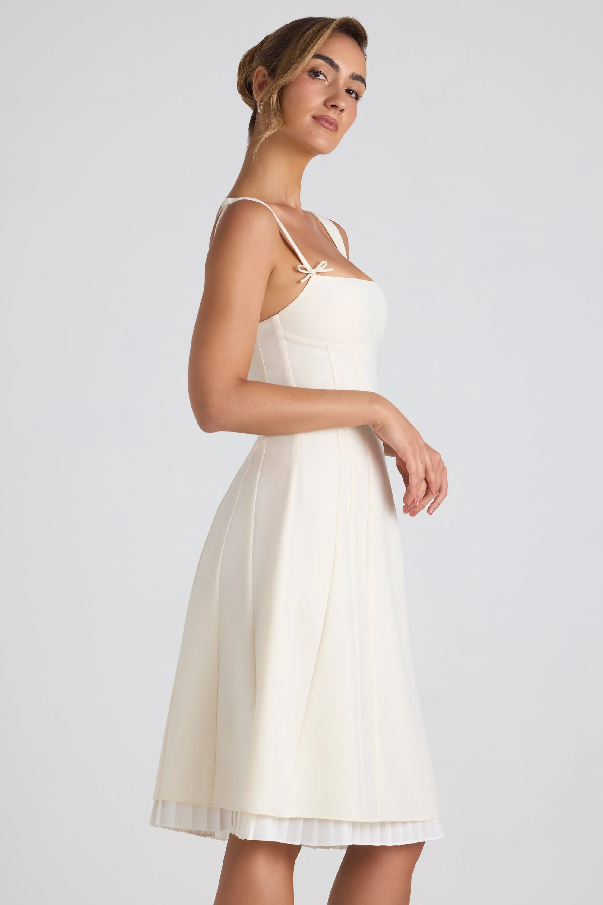 Bow-Detail Pleated A-Line Midi Dress in Ivory - TREBLEV