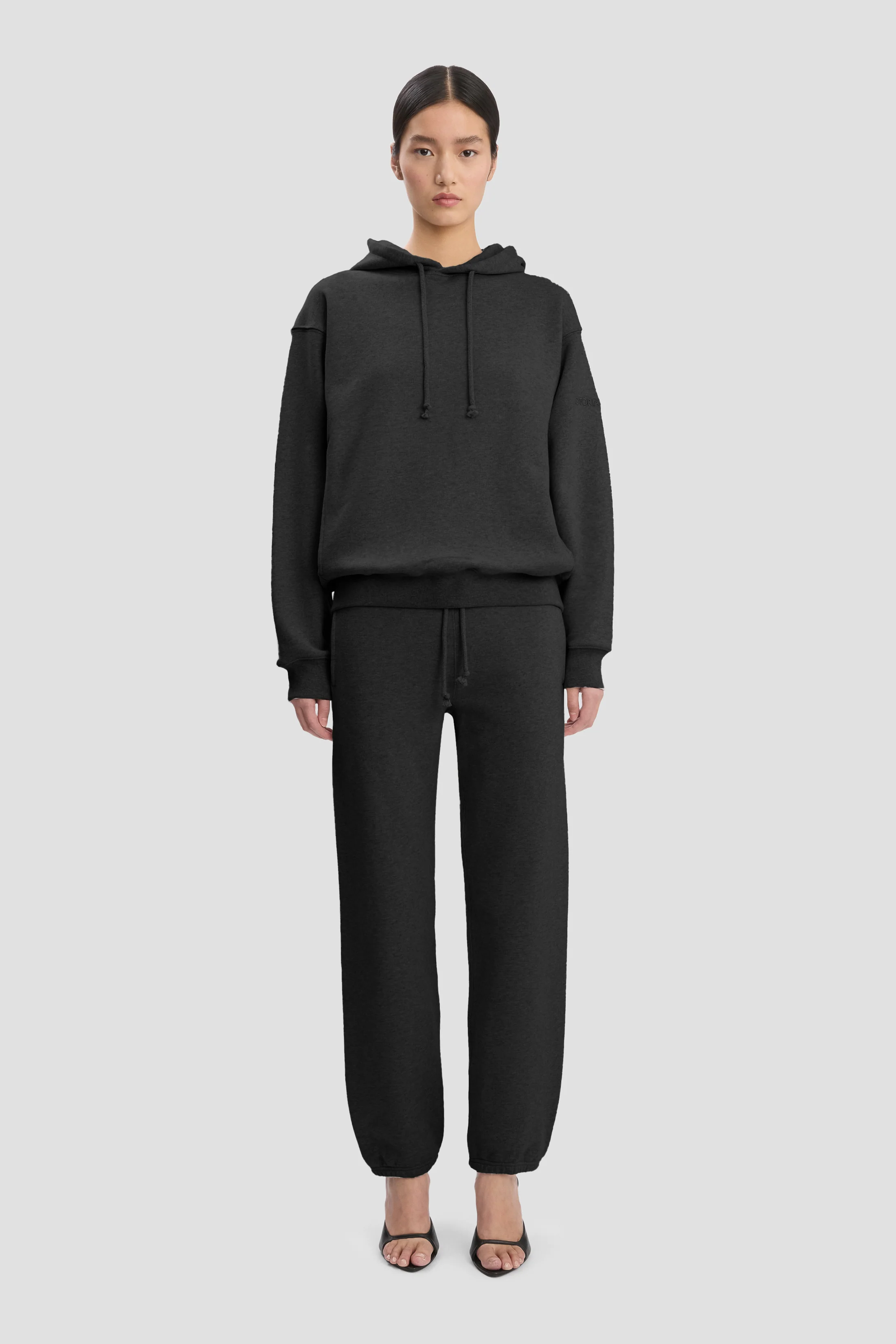 Logo Embroidered Hoodie In Black - XNAUWBI