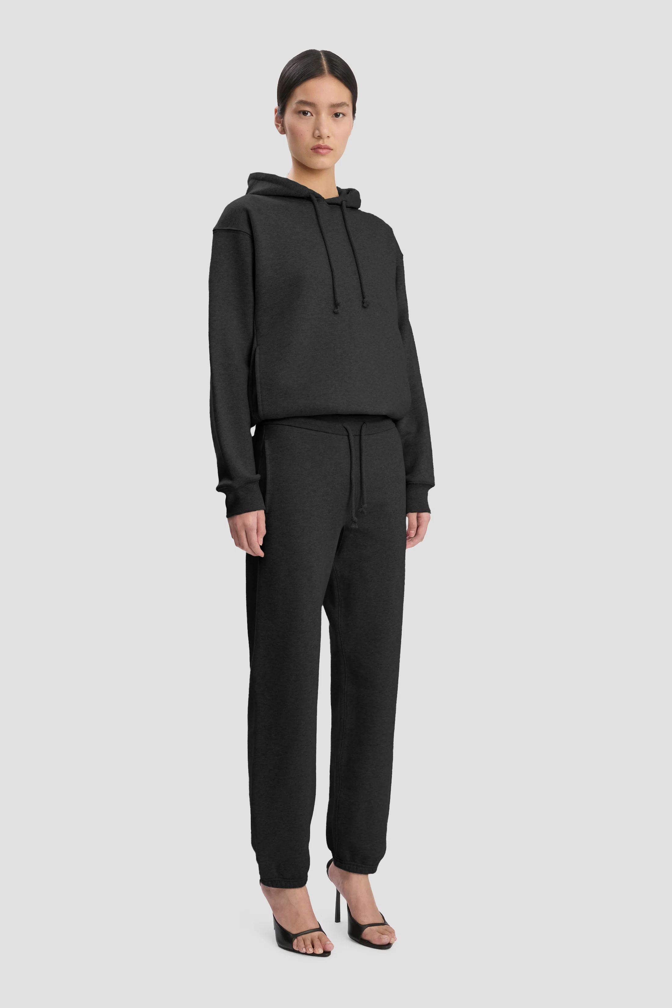 Logo Embroidered Hoodie In Black - XNAUWBI