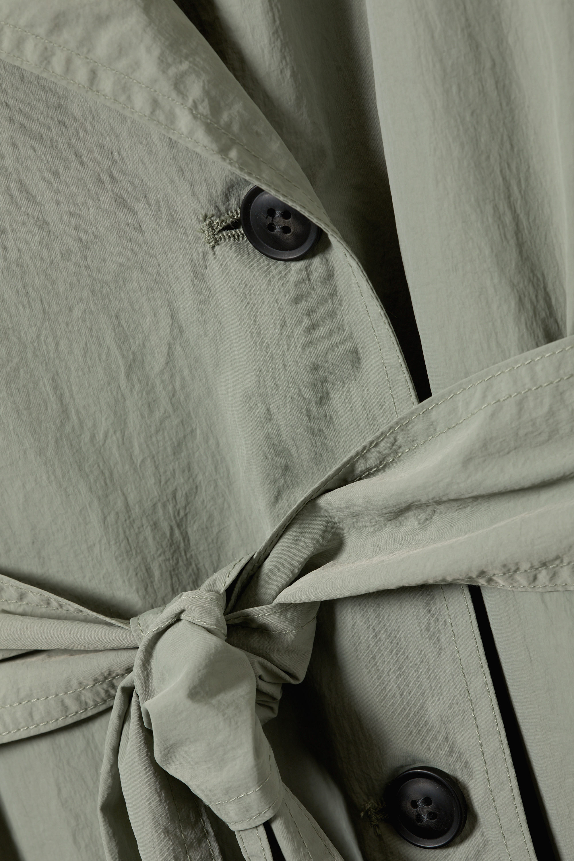 OVERSIZED BELTED NYLON TRENCH COAT - XNAUWBI