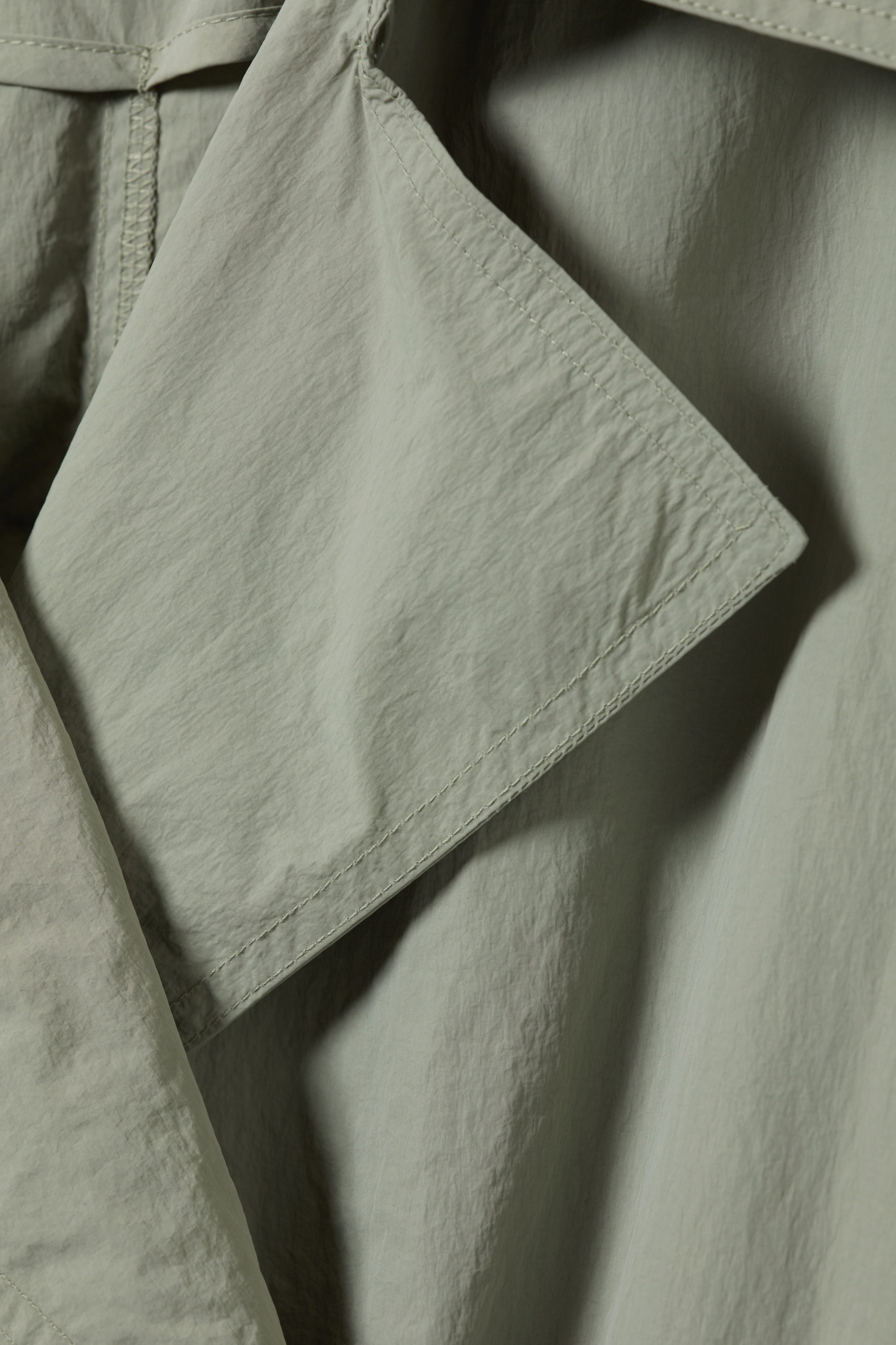 OVERSIZED BELTED NYLON TRENCH COAT - XNAUWBI