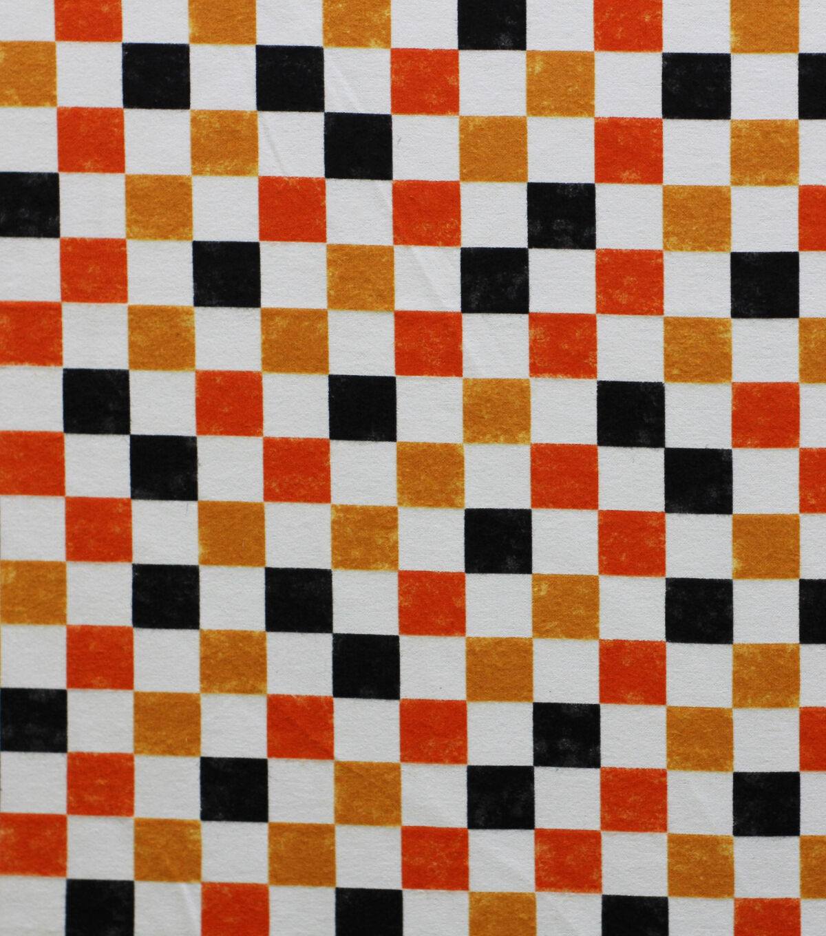 Orange Checkerboard Glow in the Dark Supr Snuggle Flannel Fabric