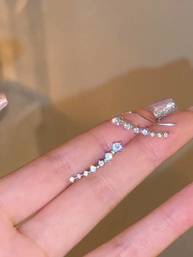 Flash diamond temperament curved earrings for women 2023 new popular light luxury earrings niche design high-end earrings trend - EHAORUI