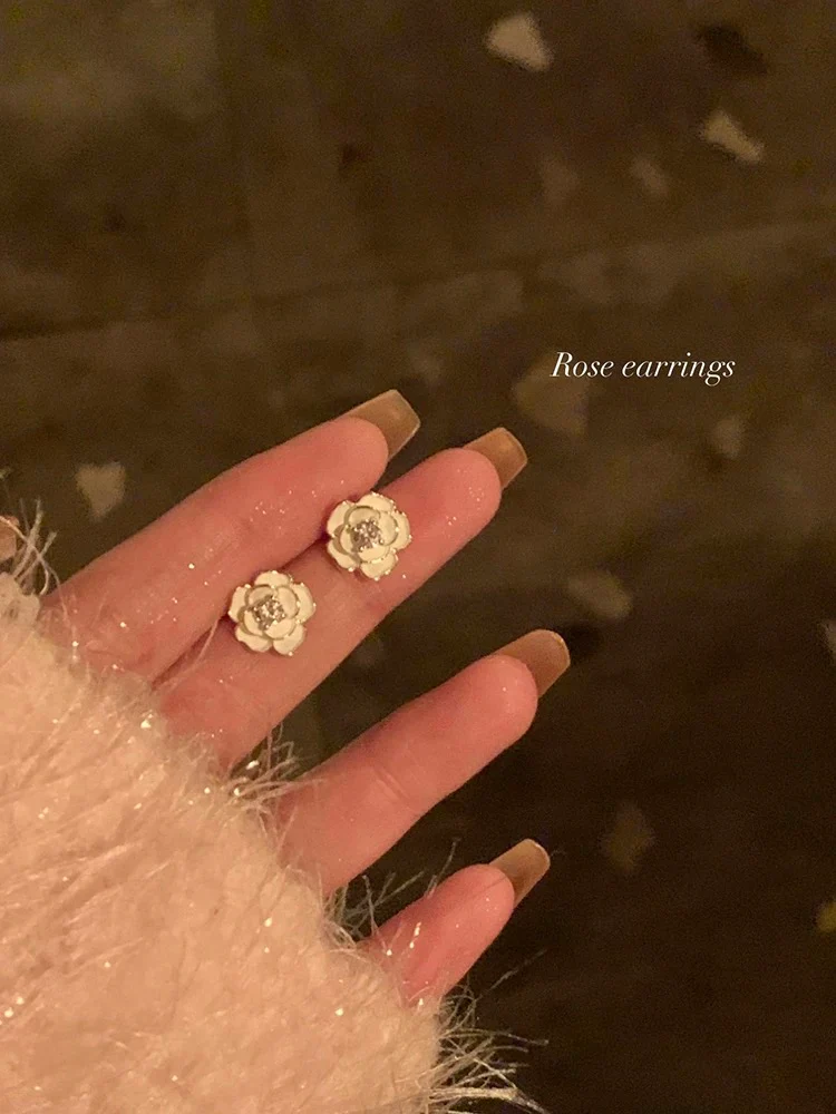 Early spring camellia earrings for women light luxury niche design high-end earrings for women mosquito coil ear clips unique earrings - EHAORUI