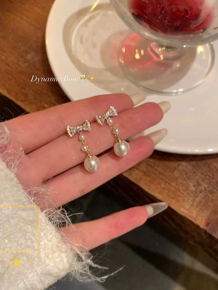 Thousands of gold exquisite bow pearl earrings for women new 2025 hot style unique earrings high-end unique earrings - EHAORUI