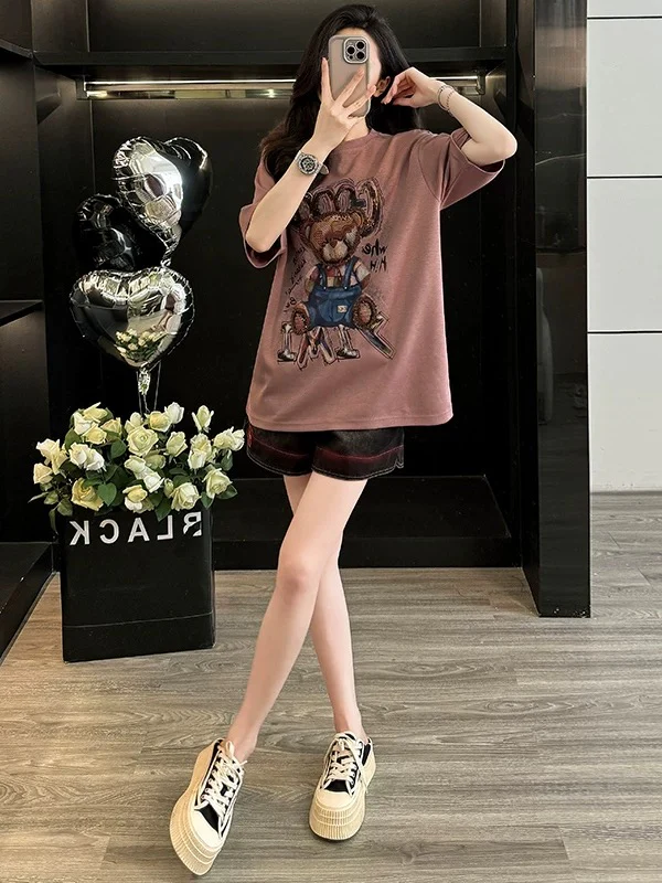 Fashionable and age-reducing leisure sports suit for women in summer, playful and cute, slimming short-sleeved T-shirt and denim shorts, two-piece suit - EHAORUI