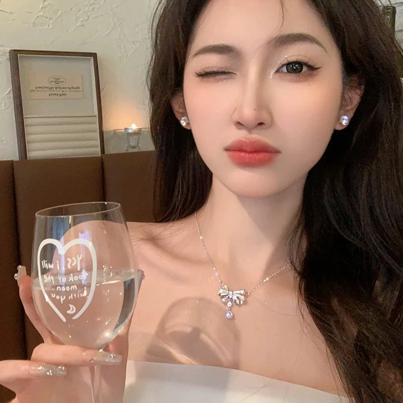 Fairy tears! 925 silver micro-paved zircon bow water drop necklace light luxury niche design high-end necklace - EHAORUI