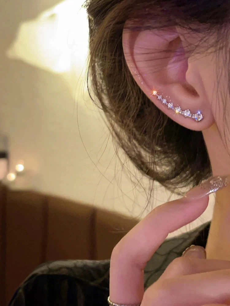 Flash diamond temperament curved earrings for women 2023 new popular light luxury earrings niche design high-end earrings trend - EHAORUI