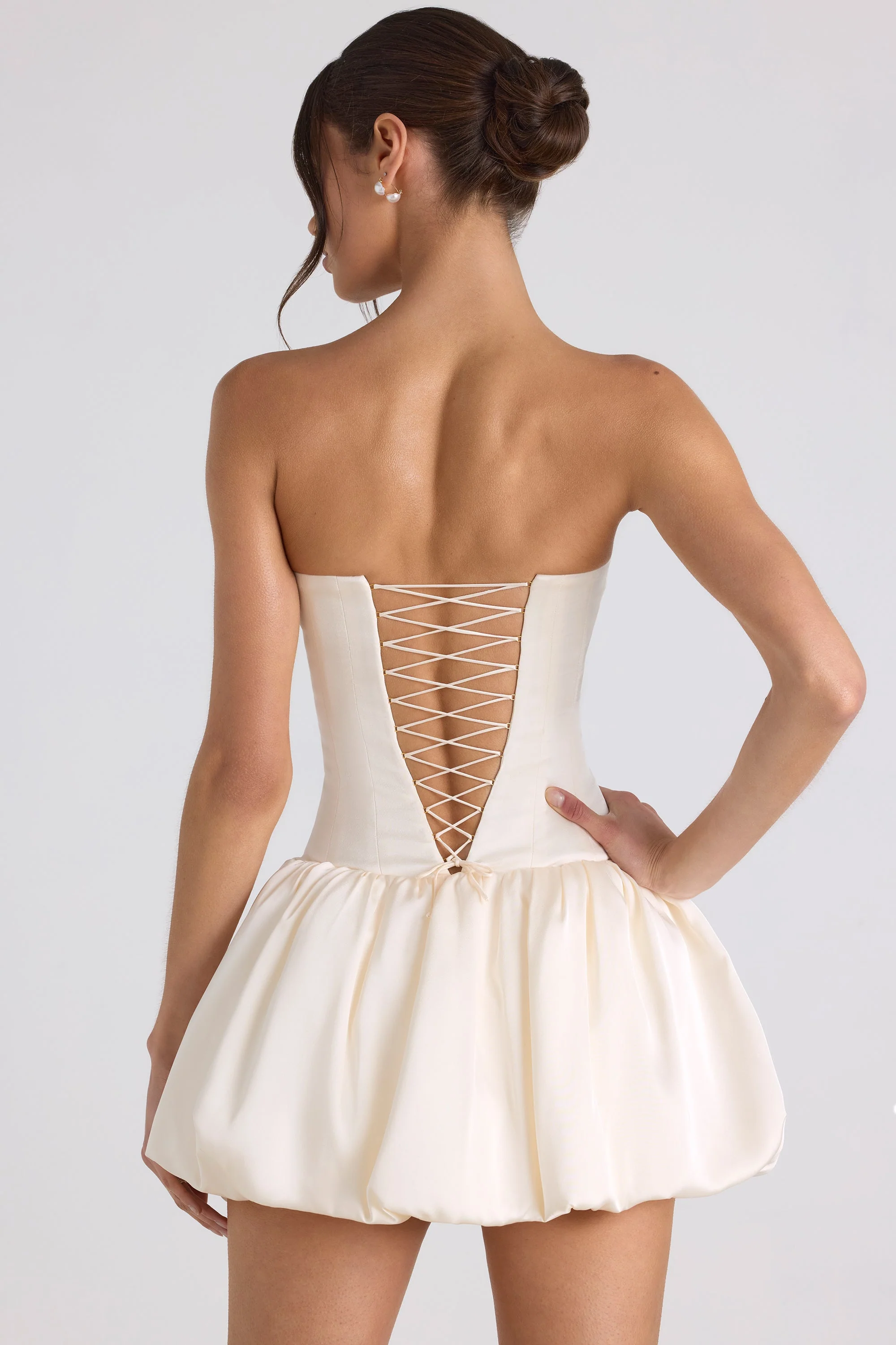 Lace-Up Bubble Hem Corset Mini Dress in Ivory - EHAORUI