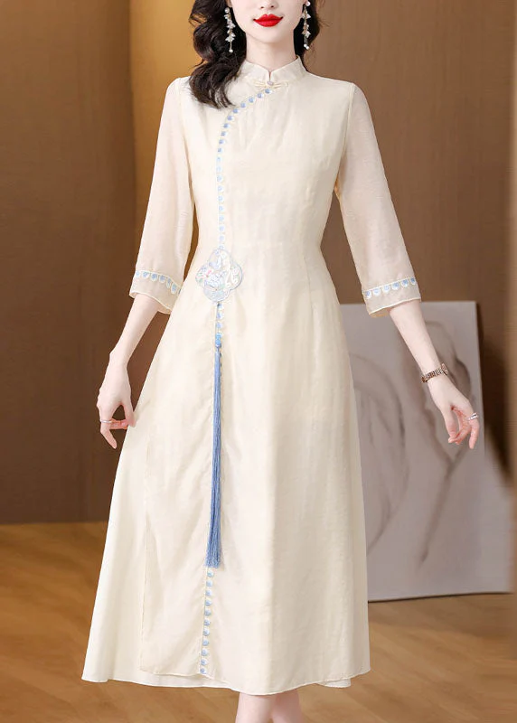 Stylish Apricot Stand Collar Embroidered Tassel Silk Long Dresses Fall - republicanstateiStylish Apricot Stand Collar Embroidered Tassel Silk Long Dresses Fall - republicanstatei