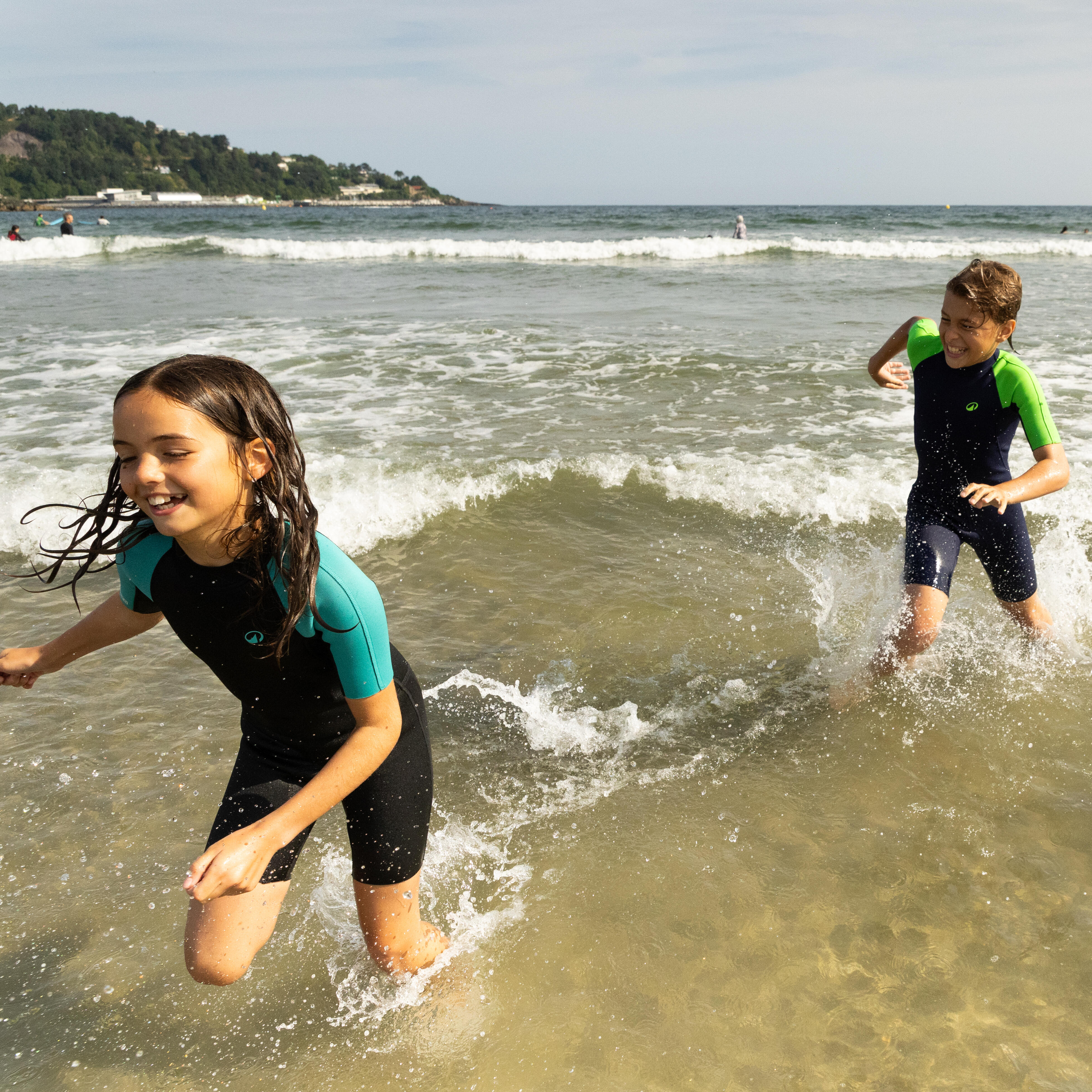 Kids' surfing shorty suit 1.5 mm YULEX100 ® black turquoise